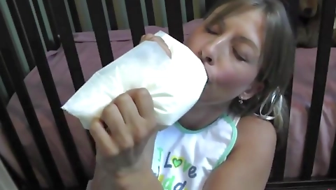 Pregnant babe feels like a baby with diapers